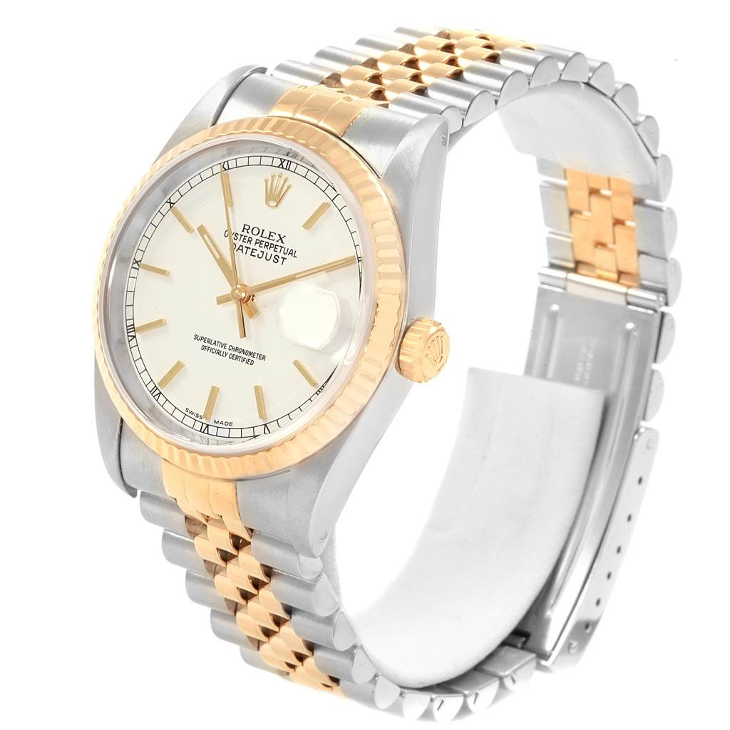 The image shows a Rolex Datejust 16233 Men
s Steel and Gold (two tone) White Dial 16233 Men
s Steel and Gold (two tone) White Dial watch, angled from the front-left, displaying its face, bezel, crown, and partially open bracelet.