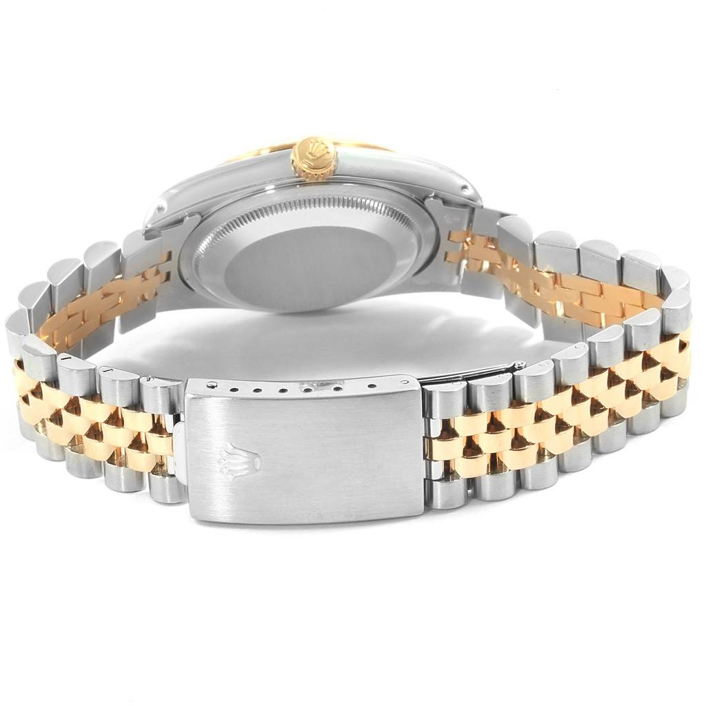 This image shows the back and side of a Rolex Datejust 16233 Men
s Steel and Gold (two tone) White Dial 16233 Men
s Steel and Gold (two tone) White Dial watch, highlighting the oyster bracelet and clasp.