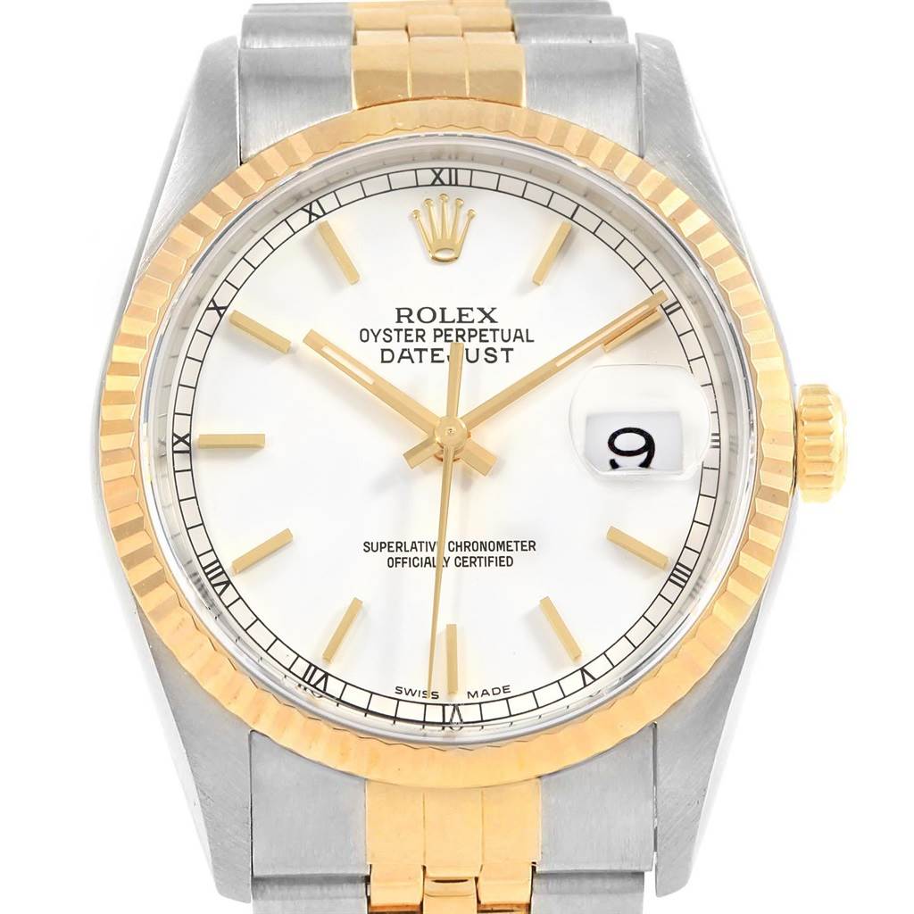The image shows a Rolex Datejust 16233 Men
s Steel and Gold (two tone) White Dial 16233 Men
s Steel and Gold (two tone) White Dial watch, highlighting its face, bezel, crown, and partial band from a front angle.