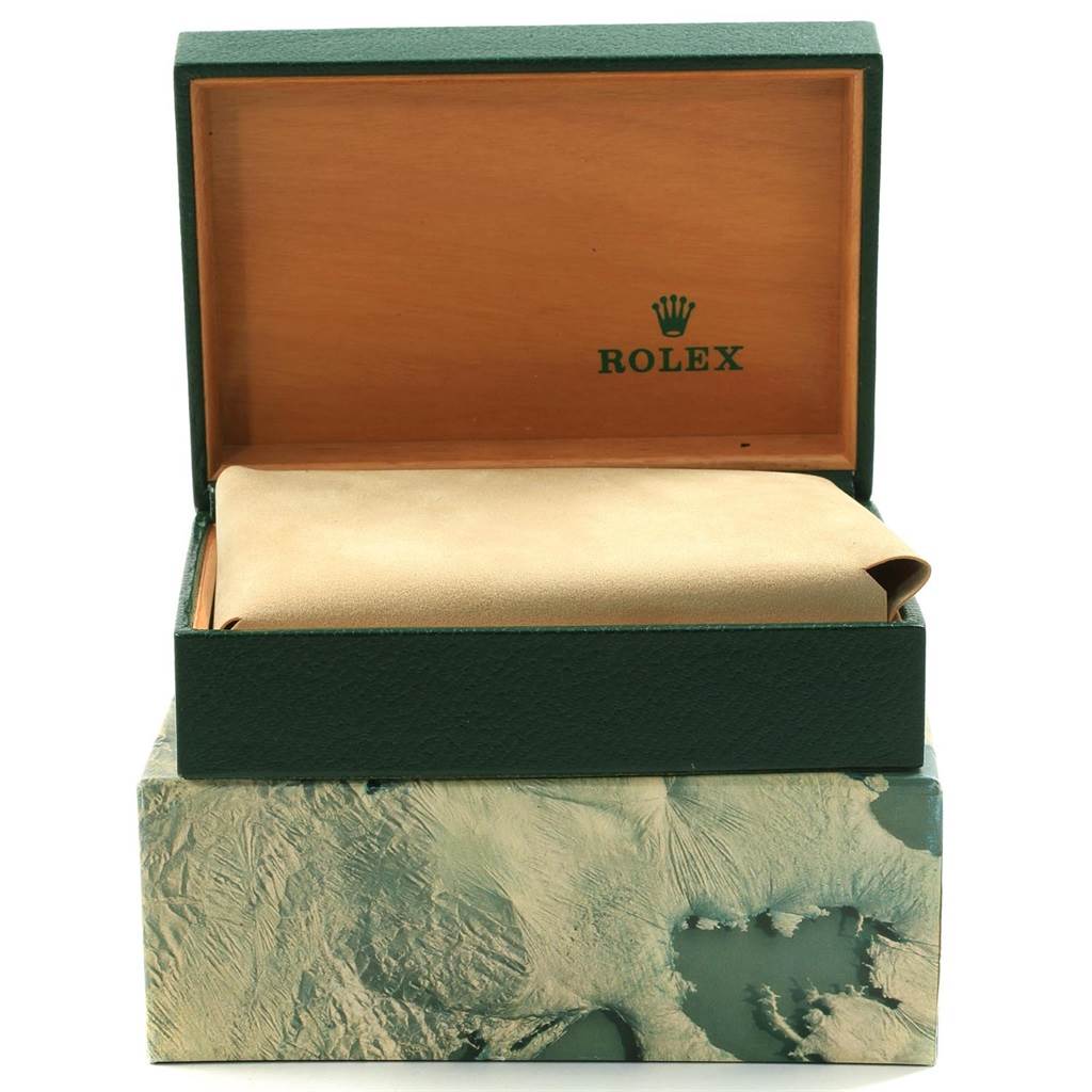 The image shows the open box of a Rolex Datejust 16233 Men's Steel and Gold (two tone) Champagne Dial 16233 Men's Steel and Gold (two tone) Champagne Dial watch, highlighting the branded interior and cushioned holder.