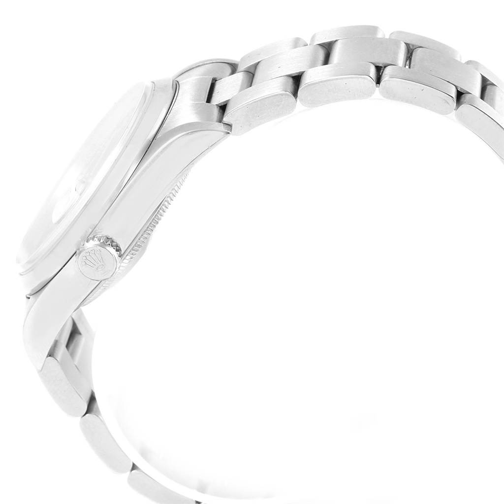 This image shows a side view of a Rolex Datejust 16200 Men's Stainless Steel Blue Dial 16200 Men's Stainless Steel Blue Dial watch, highlighting the crown, case, and part of the bracelet.