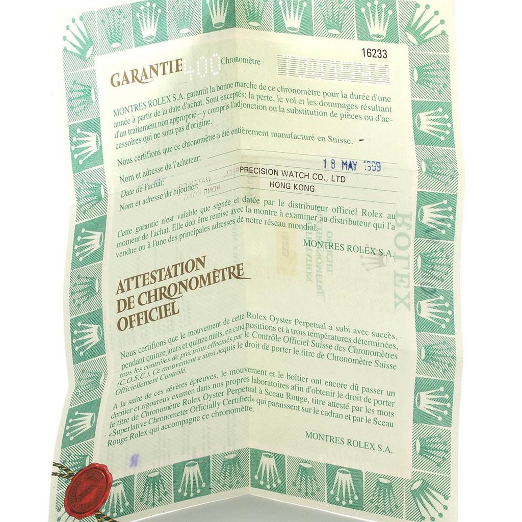 This image shows the warranty certificate for a Rolex Datejust 16233 Men's Steel and Gold (two tone) Champagne Dial 16233 Men's Steel and Gold (two tone) Champagne Dial watch, featuring official and purchase details.