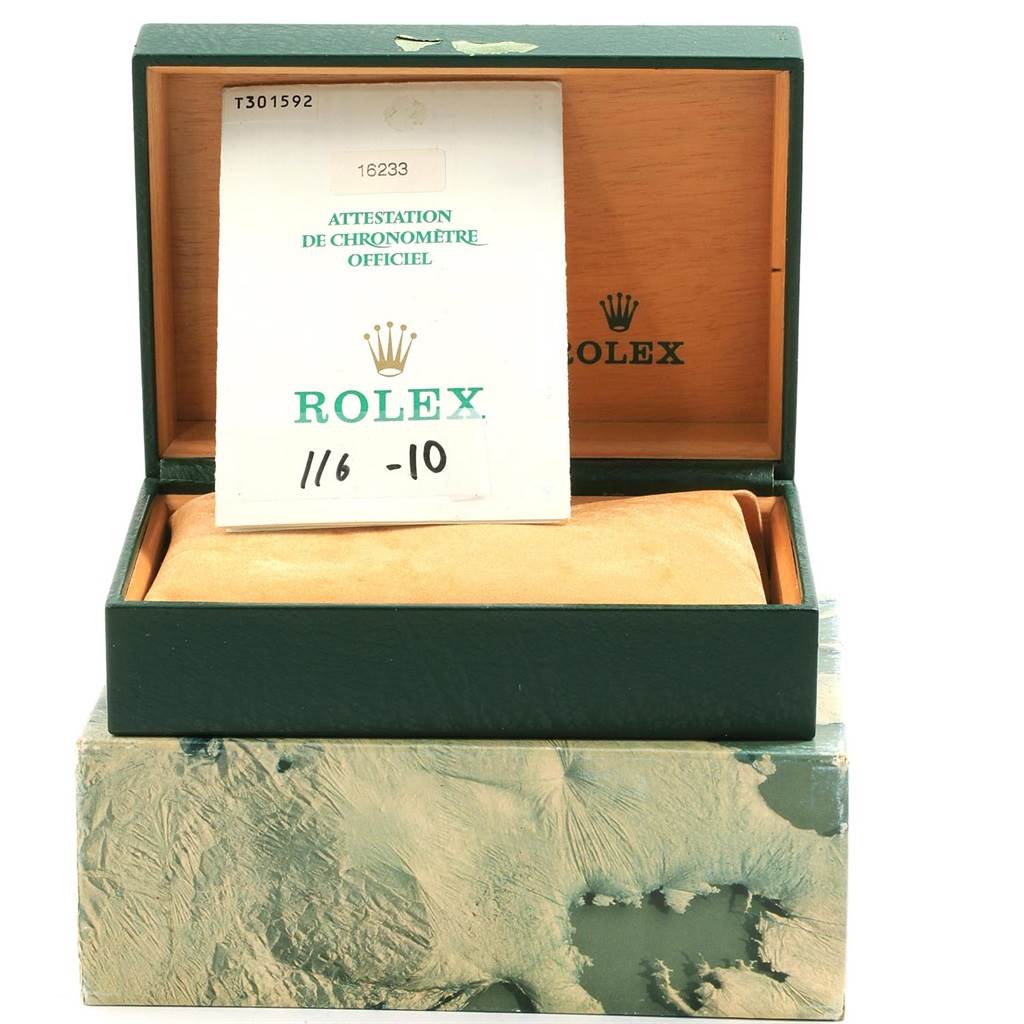 This image shows a Rolex Datejust 16233 Men's Steel and Gold (two tone) Champagne Dial 16233 Men's Steel and Gold (two tone) Champagne Dial box, including the official chronometer certification and the interior cushion.