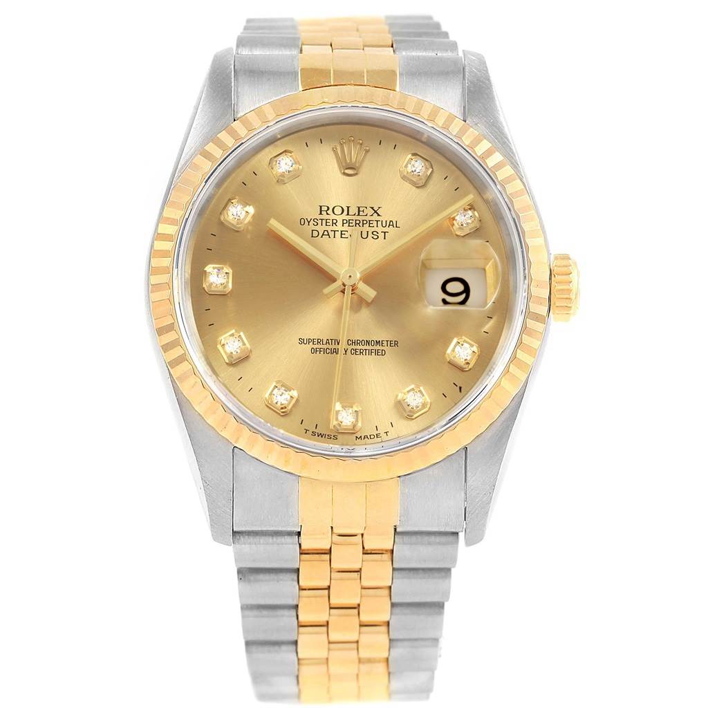 This image shows a Rolex Datejust 16233 Men's Steel and Gold (two tone) Champagne Dial 16233 Men's Steel and Gold (two tone) Champagne Dial watch from the front, highlighting the dial, hands, date window, bezel, and bracelet.