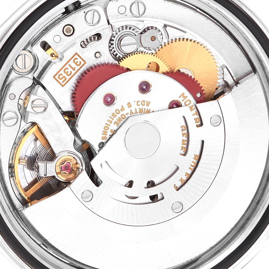 The image shows an internal close-up of the Rolex Datejust 16233 Men's Steel and Gold (two tone) Champagne Dial 16233 Men's Steel and Gold (two tone) Champagne Dial watch movement and gears from a top-down angle.