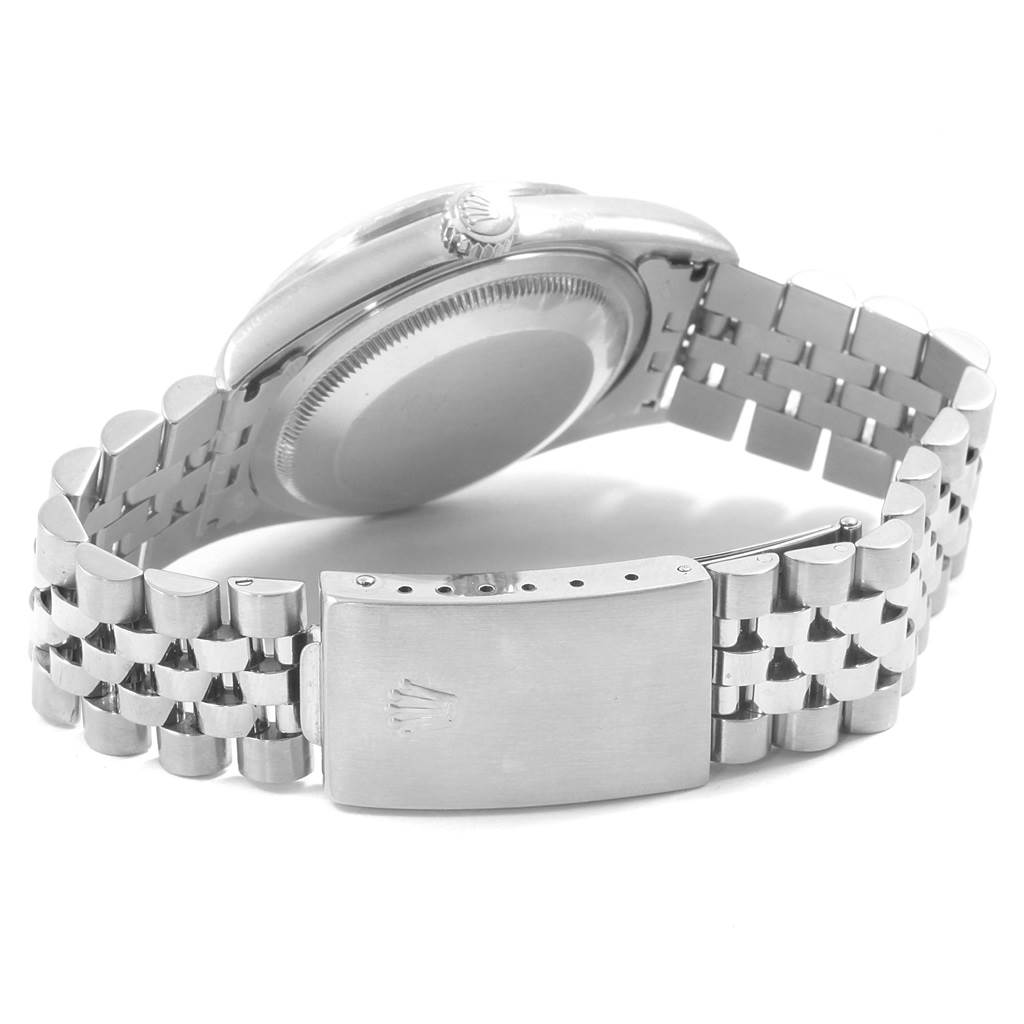 The image shows the back of the Rolex Datejust 16220 Men's Stainless Steel Blue Dial 16220 Men's Stainless Steel Blue Dial watch, focusing on the case back and bracelet clasp.