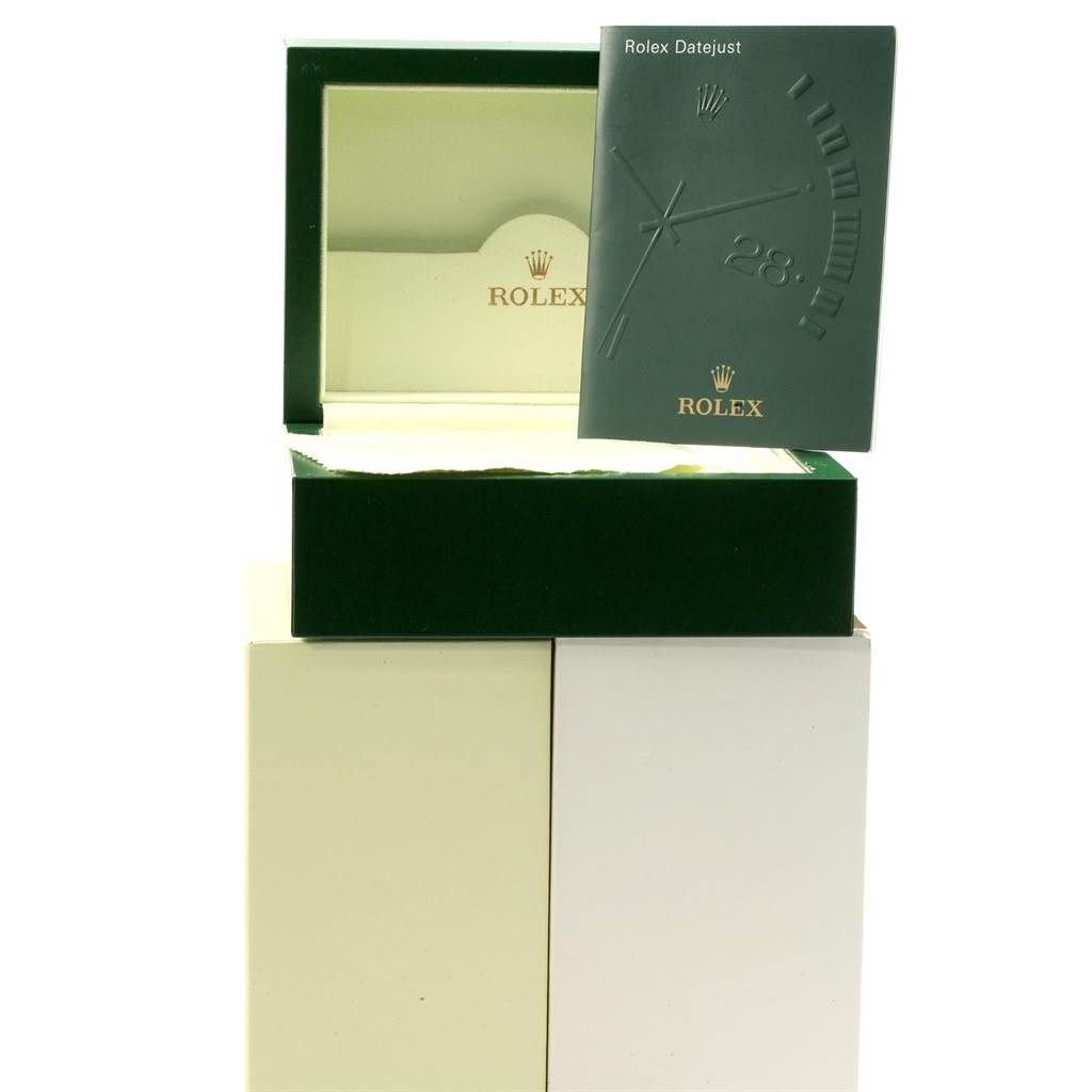 This image shows a Rolex Datejust 116203 Men's Stainless Steel White Dial 116203 Men's Stainless Steel White Dial watch box with an open lid and a Rolex booklet placed inside.