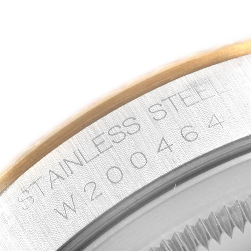 This image shows a close-up of the stainless steel case back of a Rolex Datejust 16233 Men's Steel and Gold (two tone) Champagne Dial 16233 Men's Steel and Gold (two tone) Champagne Dial watch, displaying part of the reference number.