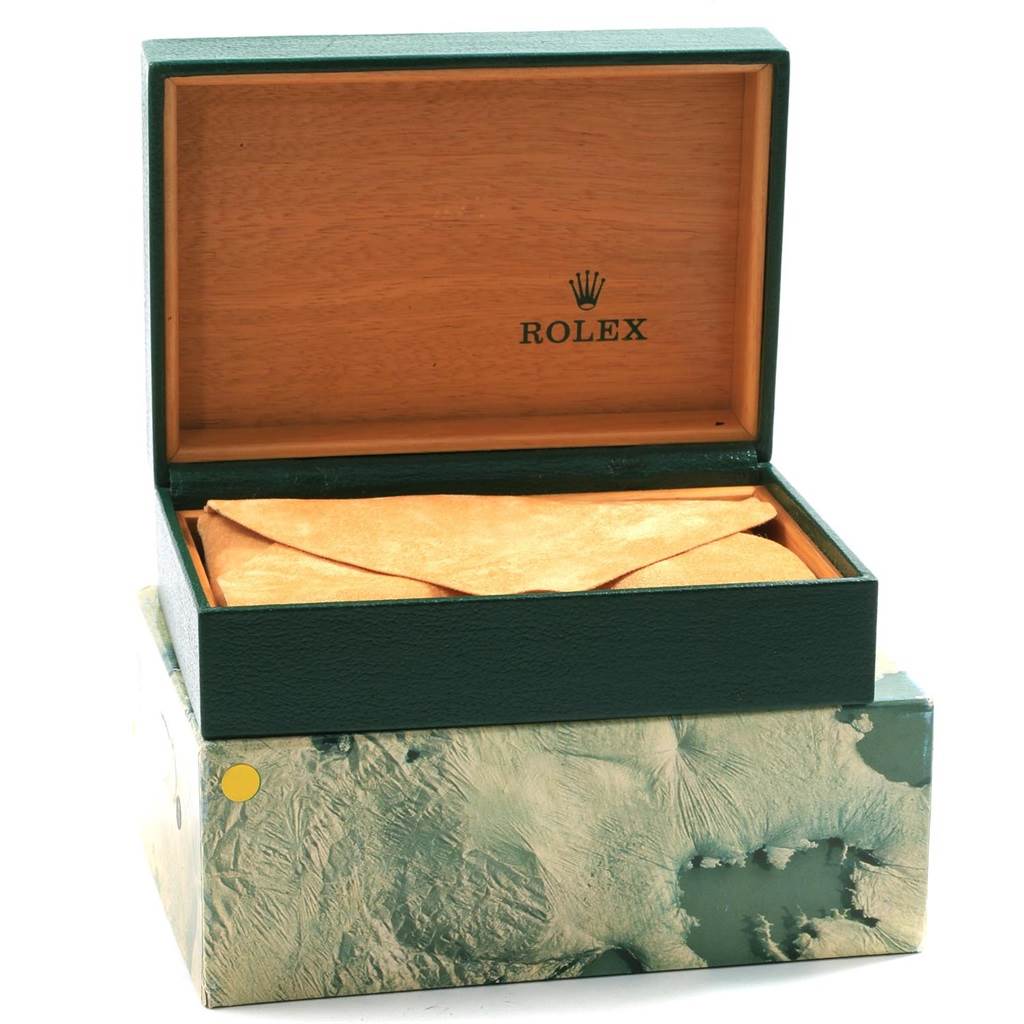 The image shows an open Rolex Datejust 16233 Men's Steel and Gold (two tone) Champagne Dial 16233 Men's Steel and Gold (two tone) Champagne Dial watch box, revealing the inner wooden compartment with a beige envelope inside.