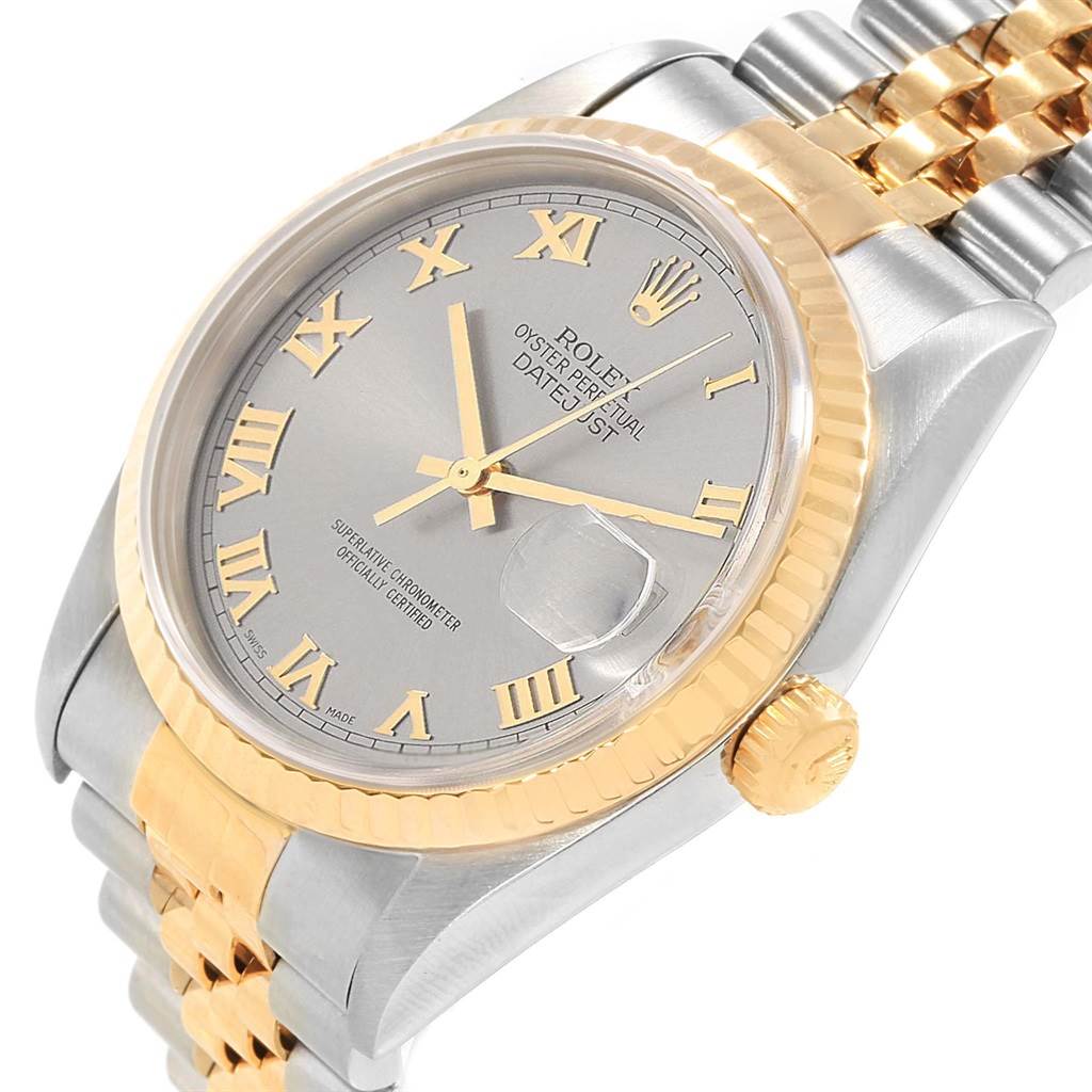 This image shows a close-up, angled view of a Rolex Datejust 16233 Men's Steel and Gold (two tone) Grey Dial 16233 Men's Steel and Gold (two tone) Grey Dial watch, highlighting its dial, bezel, crown, and part of the bracelet.