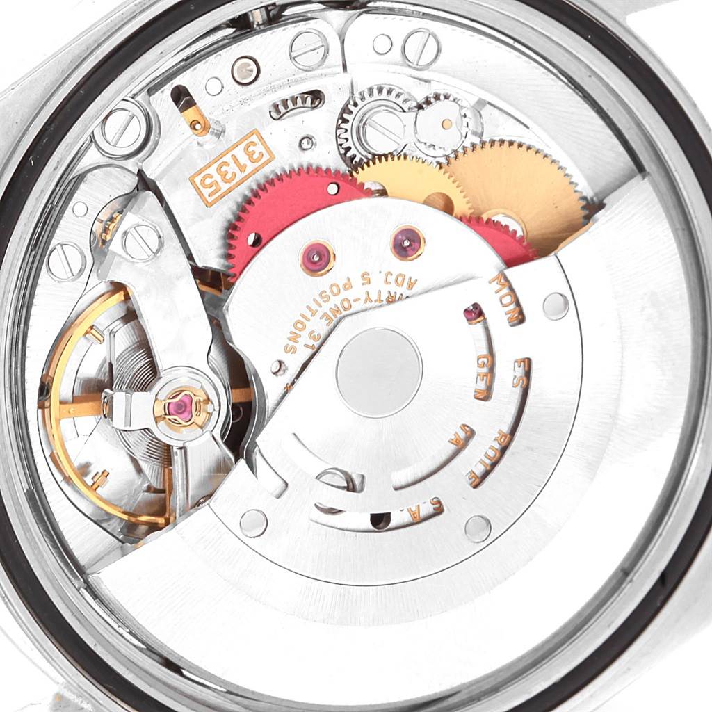This image shows the movement mechanism inside the Rolex Datejust 16233 Men's Steel and Gold (two tone) Grey Dial 16233 Men's Steel and Gold (two tone) Grey Dial watch from a close-up, rear angle view.