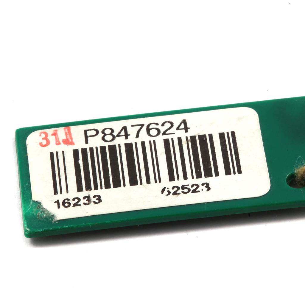 This image shows a green tag with a barcode and serial number for the Rolex Datejust 16233 Men's Steel and Gold (two tone) Grey Dial 16233 Men's Steel and Gold (two tone) Grey Dial model watch.