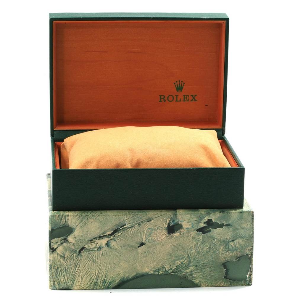 This image shows an open Rolex Datejust 16233 Steel and Gold (two tone) Champagne Dial 16233 Steel and Gold (two tone) Champagne Dial watch box with a cushion inside.