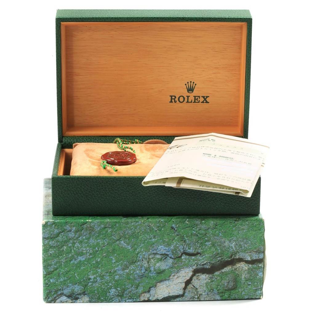 The image shows a Rolex Datejust 16233 Men's Steel and Gold (two tone) Champagne Dial 16233 Men's Steel and Gold (two tone) Champagne Dial watch box and accessories, including a pouch, a tag, and documents.