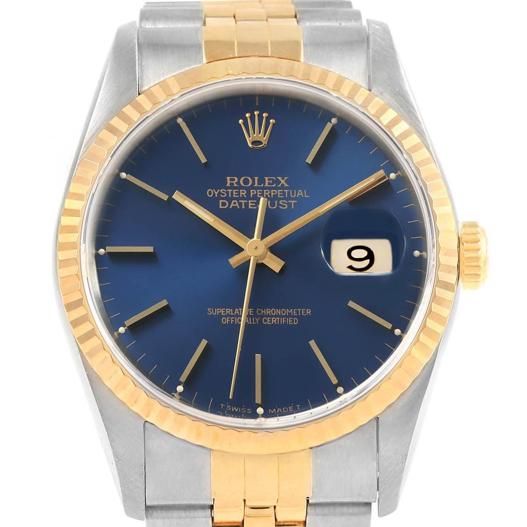This image shows a Rolex Datejust 16233 Men's Steel and Gold (two tone) Blue Dial 16233 Men's Steel and Gold (two tone) Blue Dial watch from a front view, highlighting its blue dial, gold markers, and date window.