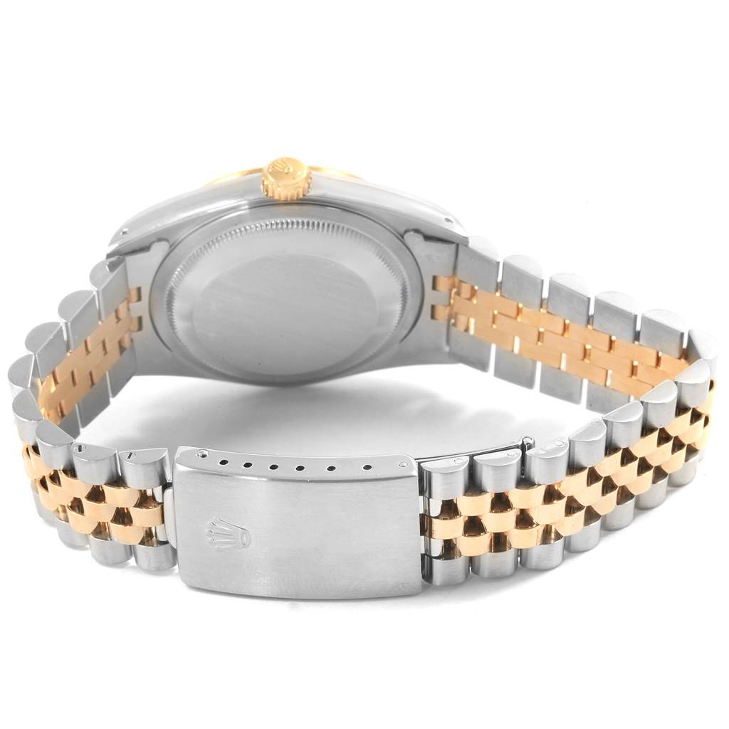 This image of the Rolex Datejust 16233 Men's Steel and Gold (two tone) Blue Dial 16233 Men's Steel and Gold (two tone) Blue Dial watch shows the case back, crown, and two-tone bracelet from a rear angle.