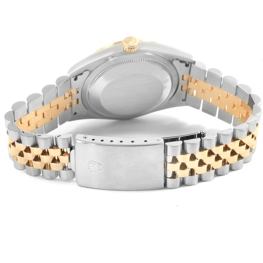 The image shows the back view of a Rolex Datejust 16233 Men's Steel and Gold (two tone) Champagne Dial 16233 Men's Steel and Gold (two tone) Champagne Dial watch, highlighting its closed clasp and Jubilee bracelet.