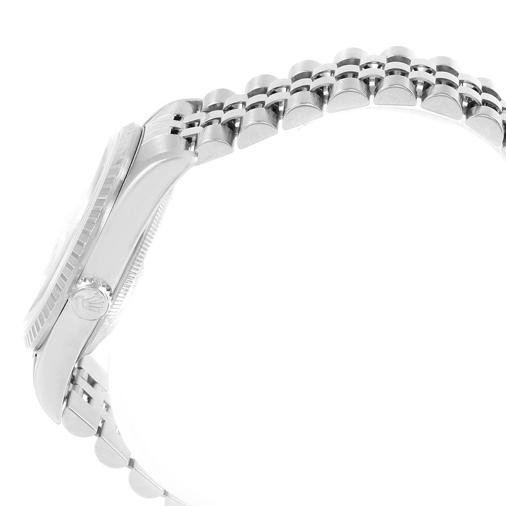 The Rolex Datejust 16220 Men's Stainless Steel Silver Dial 16220 Men's Stainless Steel Silver Dial watch is shown from a side angle, highlighting the case, crown, and bracelet.