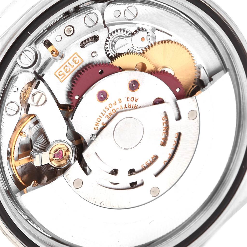 This image shows the internal mechanism of a Rolex Datejust 16220 Men's Stainless Steel Silver Dial 16220 Men's Stainless Steel Silver Dial model watch, displaying gears and other components.