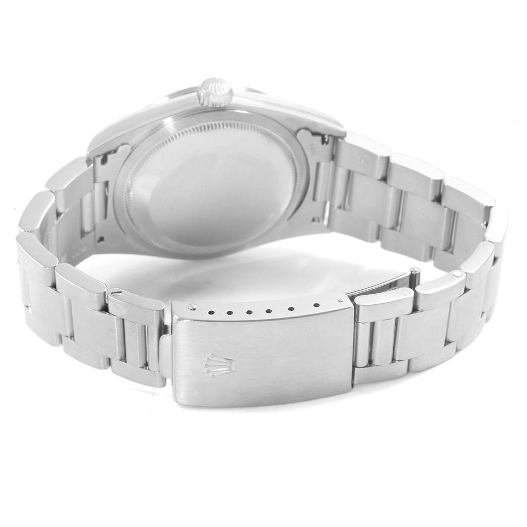 The image shows the back and bracelet of a Rolex Datejust 16220 Men's Stainless Steel Silver Dial 16220 Men's Stainless Steel Silver Dial watch, highlighting the clasp and case back.