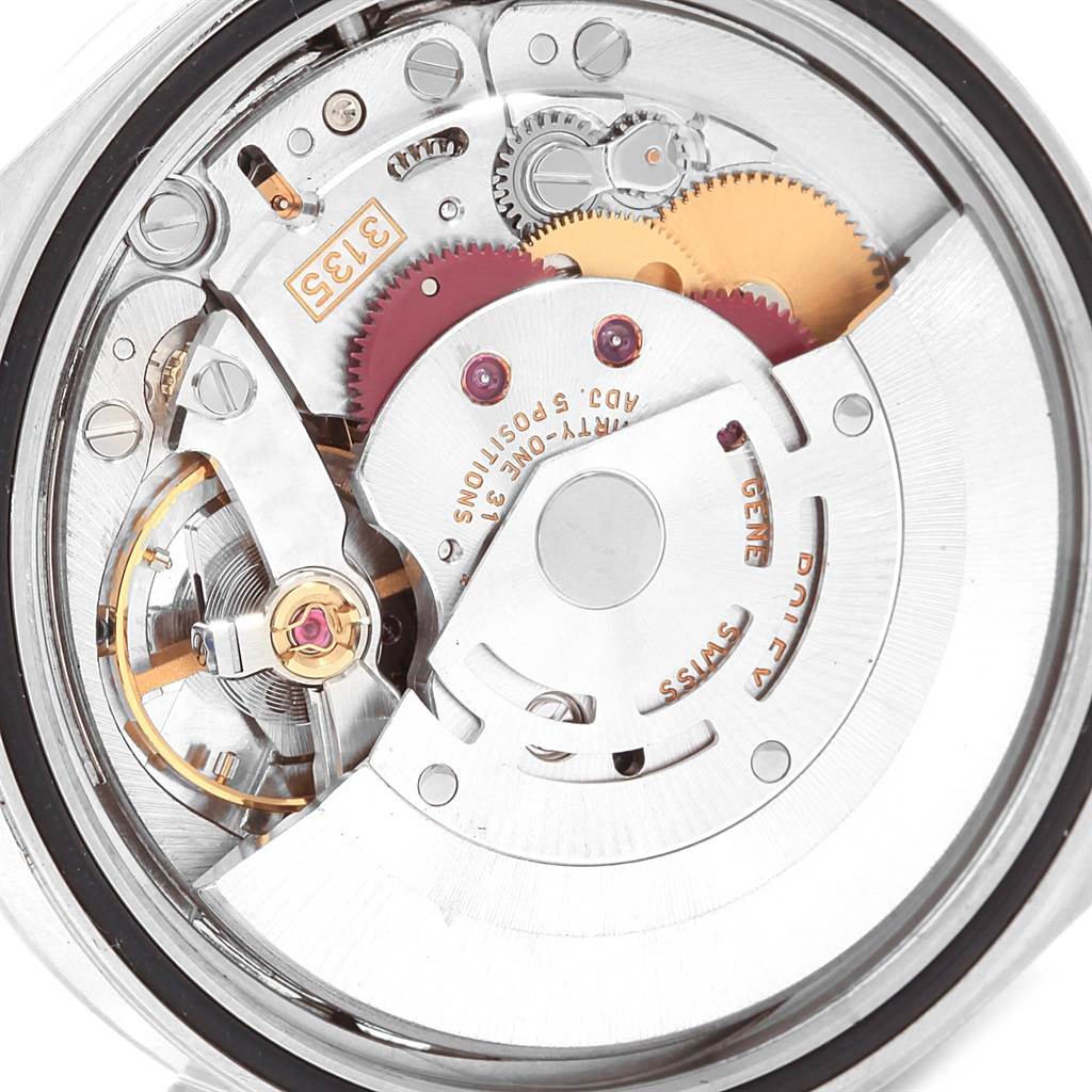 This image shows an inside view of the Rolex Datejust 16220 Men's Stainless Steel Silver Dial 16220 Men's Stainless Steel Silver Dial model, highlighting its intricate mechanical movement components.