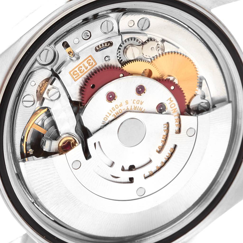 This image shows the internal mechanism and movement of a Rolex Datejust 16220 Men
s Stainless Steel Silver Dial 16220 Men
s Stainless Steel Silver Dial watch from a rear view angle.