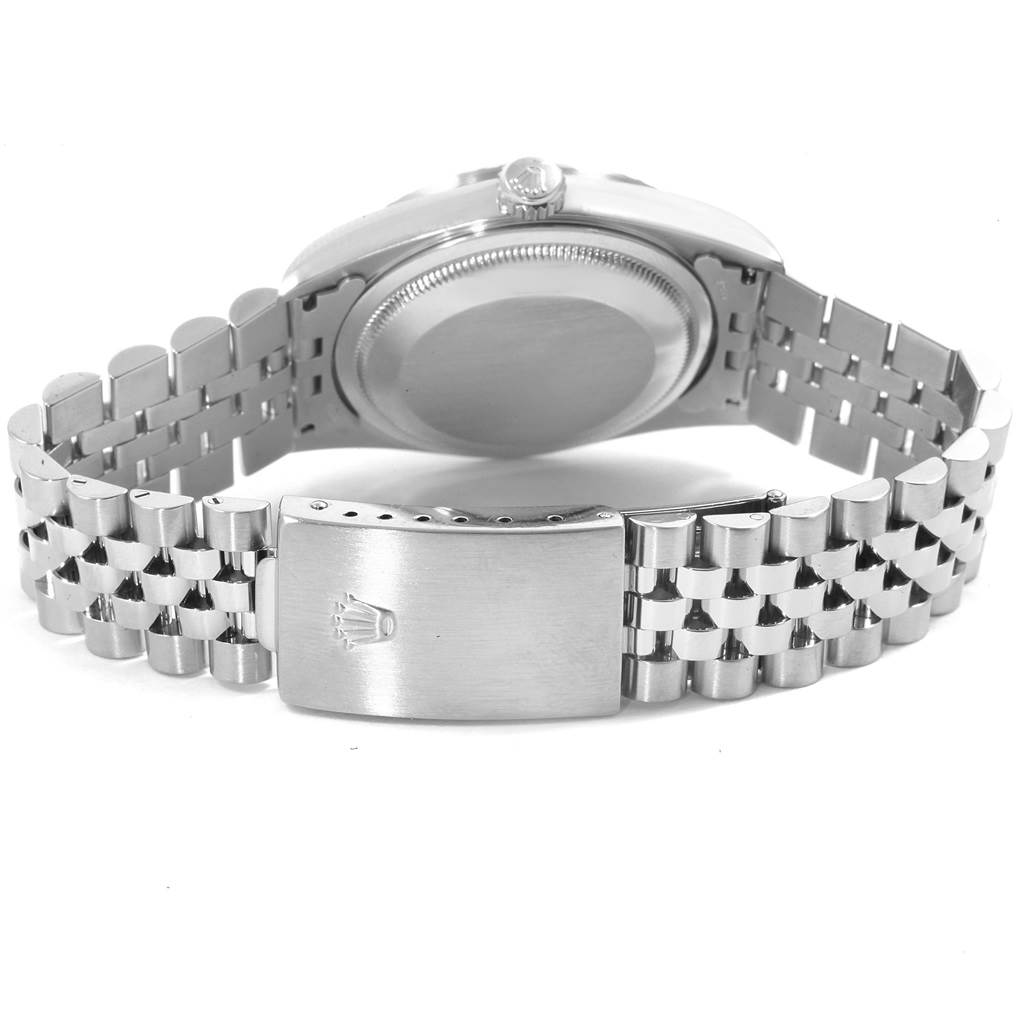 The image shows the rear view of a Rolex Datejust 16220 Men
s Stainless Steel Silver Dial 16220 Men
s Stainless Steel Silver Dial watch, highlighting the case back and bracelet with the clasp.