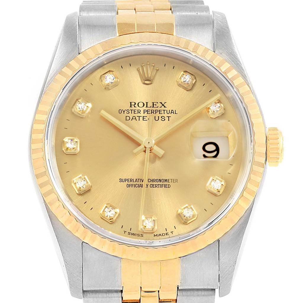 This image shows the face and partial bracelet of a Rolex Datejust 16233 Men's Steel and Gold (two tone) Champagne Dial 16233 Men's Steel and Gold (two tone) Champagne Dial watch from a front angle.
