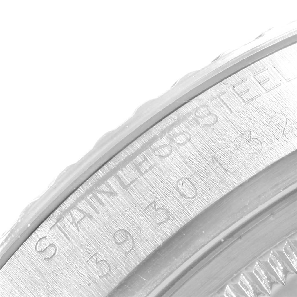 This image shows a close-up of the stainless steel case back of a Rolex Datejust 16030 Men's Stainless Steel White Dial 16030 Men's Stainless Steel White Dial watch.