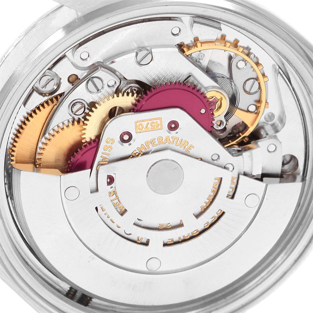 This image shows an internal view of a Rolex Datejust 16030 Men's Stainless Steel White Dial 16030 Men's Stainless Steel White Dial watch movement, highlighting the gears and mechanical components.