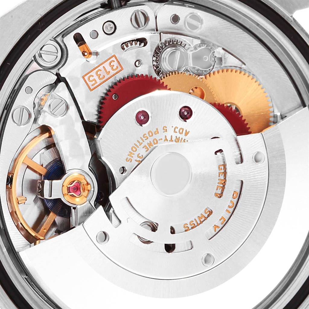 This image shows a close-up of the movement mechanism inside a Rolex Datejust 116231 Men's Steel and Gold (two tone) Black Dial 116231 Men's Steel and Gold (two tone) Black Dial watch.