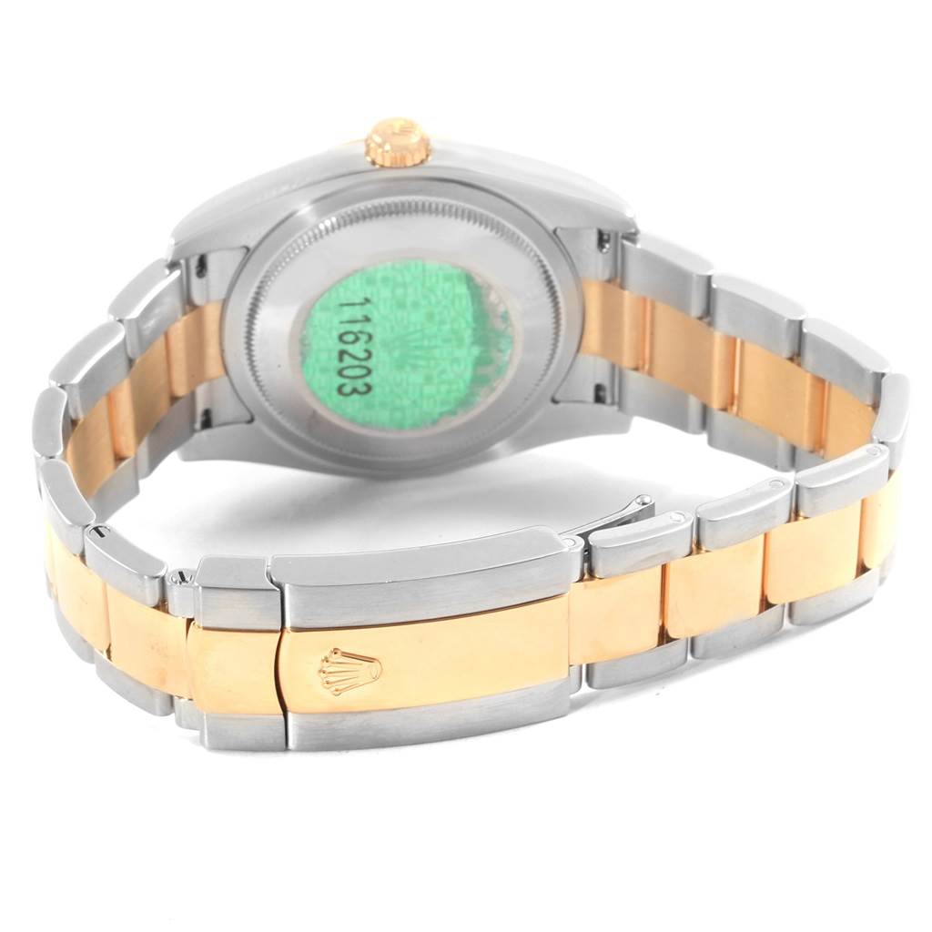 This image of the Rolex Datejust 116203 Men's Stainless Steel Grey Dial 116203 Men's Stainless Steel Grey Dial watch shows its back side and bracelet, highlighting the two-tone design and the clasp with the Rolex logo.