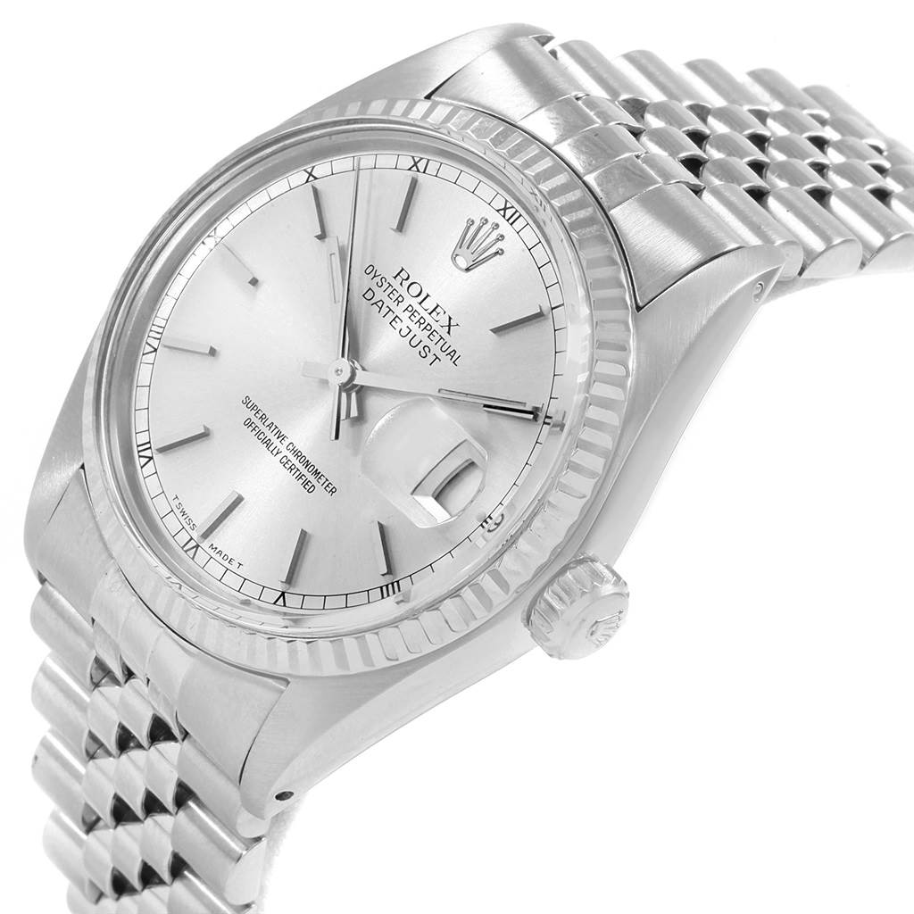 This image shows a Rolex Datejust 16014 Men's Stainless Steel Silver Dial 16014 Men's Stainless Steel Silver Dial watch at a slight angle, showcasing the dial, fluted bezel, and part of the bracelet.