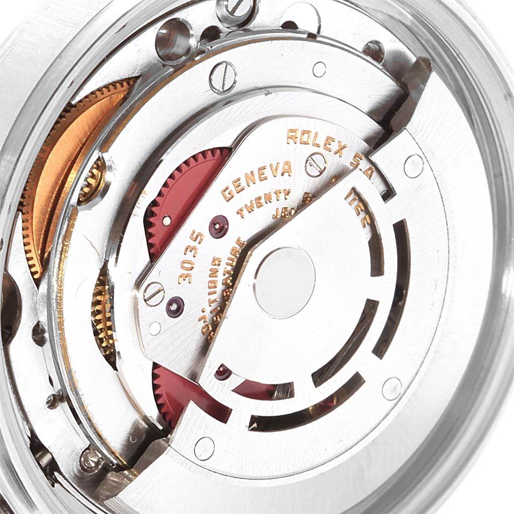 This image shows a close-up view of the internal mechanical movement of a Rolex Datejust 16014 Men's Stainless Steel Silver Dial 16014 Men's Stainless Steel Silver Dial watch.