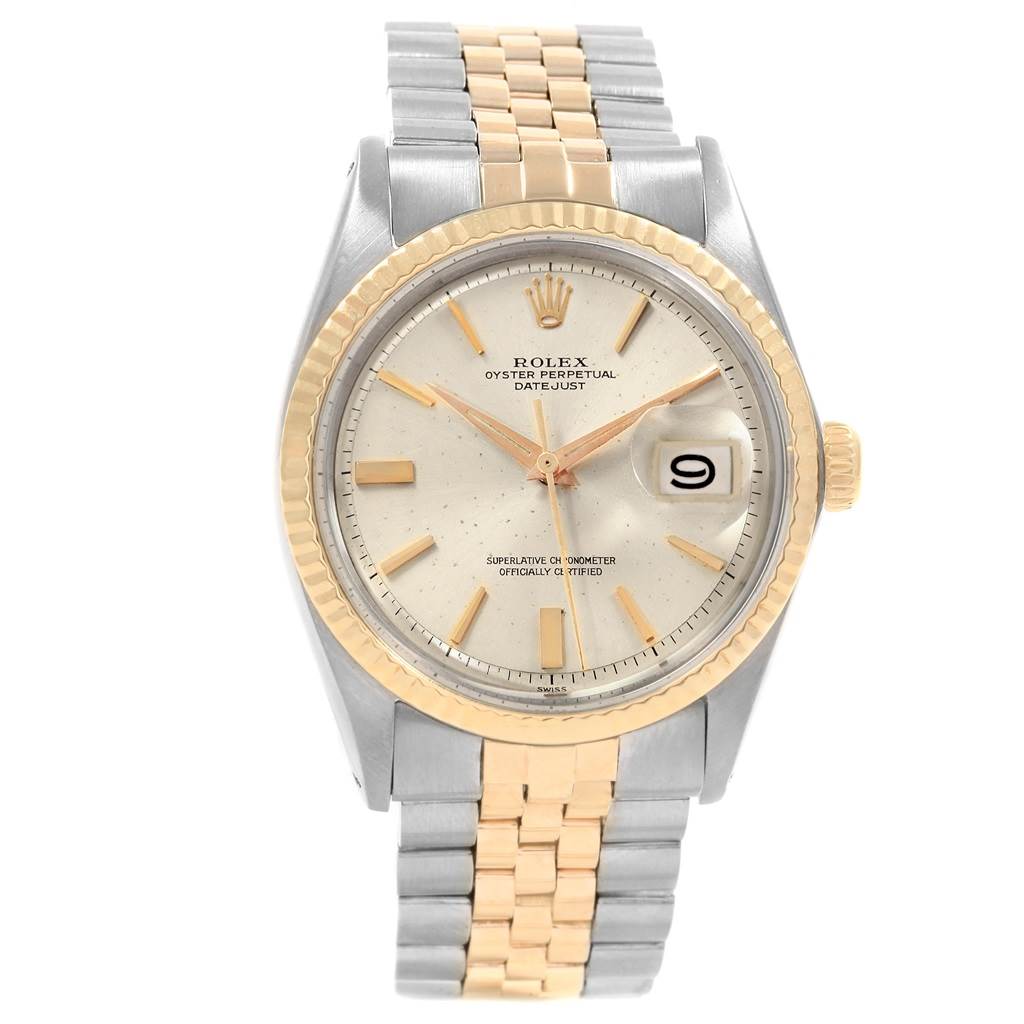 This Rolex Vintage Collection 1601 Men's Steel and Gold (two tone) Silver Dial 1601 Men's Steel and Gold (two tone) Silver Dial model shows the face, bezel, and bracelet of the watch from a front view.