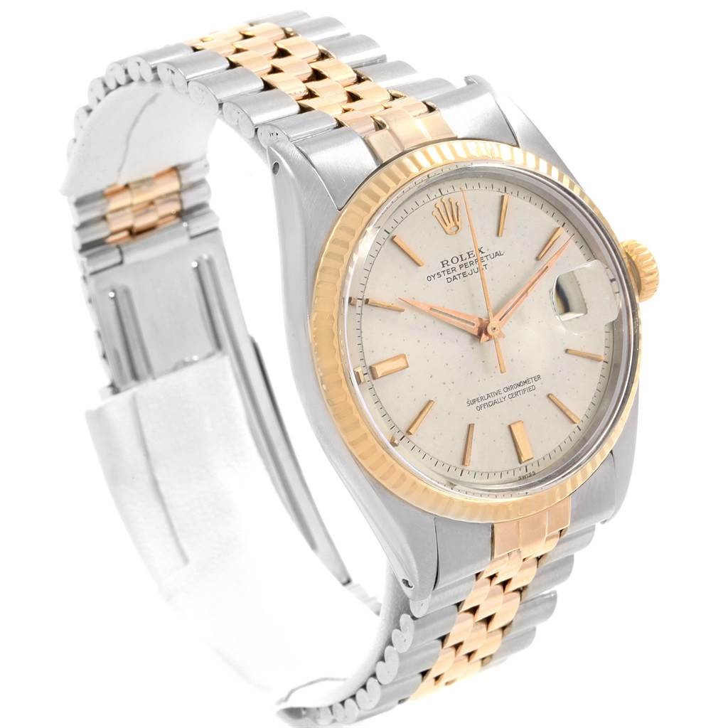 The Rolex Vintage Collection 1601 Men's Steel and Gold (two tone) Silver Dial 1601 Men's Steel and Gold (two tone) Silver Dial watch is shown at a slight tilt, highlighting its two-tone bracelet, face, and date display.