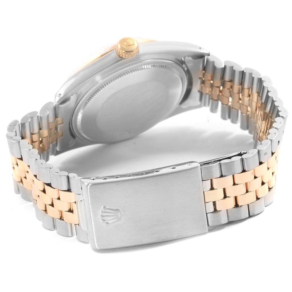 The back view of the Rolex Vintage Collection 1601 Men's Steel and Gold (two tone) Silver Dial 1601 Men's Steel and Gold (two tone) Silver Dial watch, showcasing its clasp and two-tone bracelet.