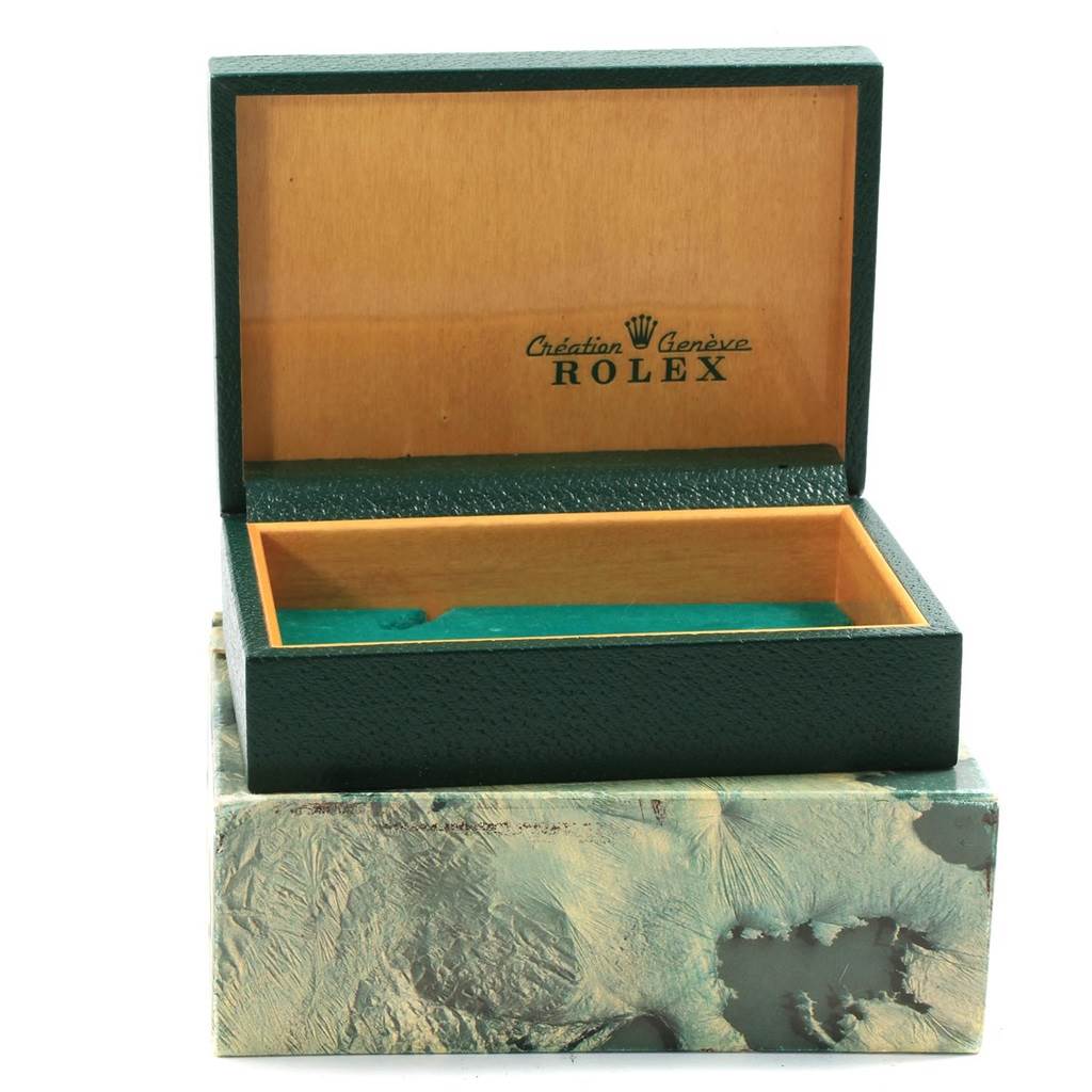 The image shows an open, empty watch box for the Vintage Collection model by Rolex, viewed from the front.