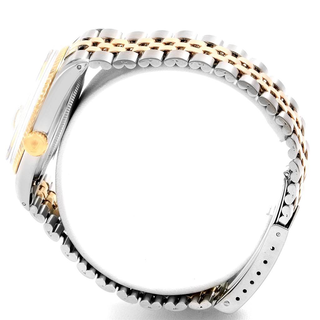 The image shows a side angle of a Rolex Vintage Collection 1601 Men's Steel and Gold (two tone) Silver Dial 1601 Men's Steel and Gold (two tone) Silver Dial model, highlighting the crown, case, and bracelet.