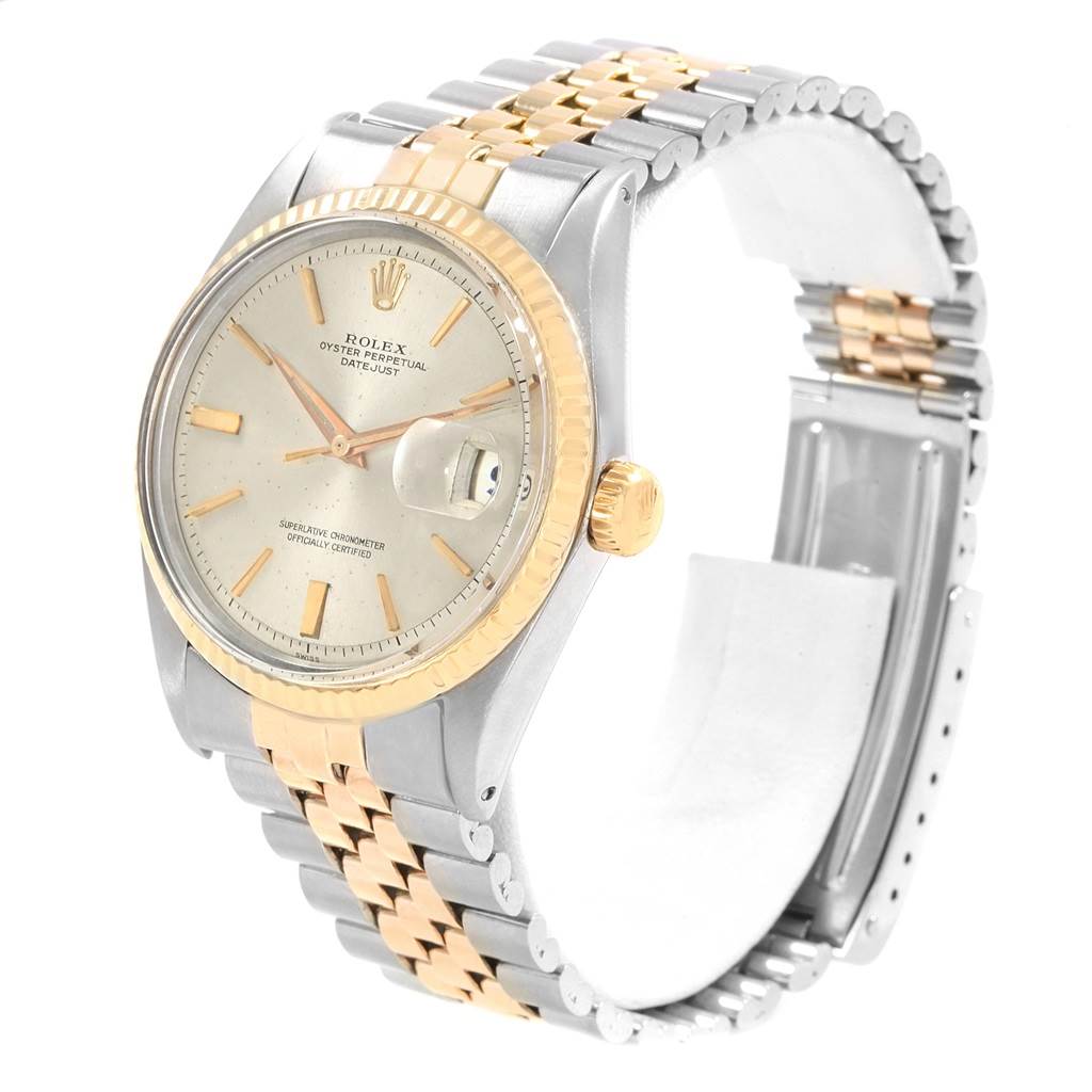 The Rolex Vintage Collection 1601 Men's Steel and Gold (two tone) Silver Dial 1601 Men's Steel and Gold (two tone) Silver Dial model watch is shown at a slight angle showcasing its dial, fluted bezel, and two-tone metal bracelet.