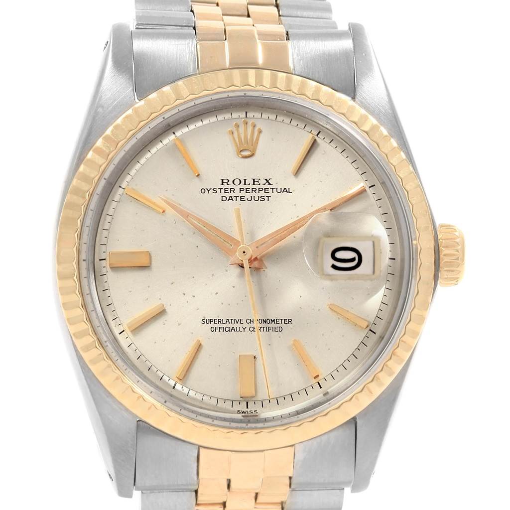 The image shows a front view of a Rolex Vintage Collection 1601 Men's Steel and Gold (two tone) Silver Dial 1601 Men's Steel and Gold (two tone) Silver Dial model watch, highlighting its face, hands, date, bezel, and bracelet.
