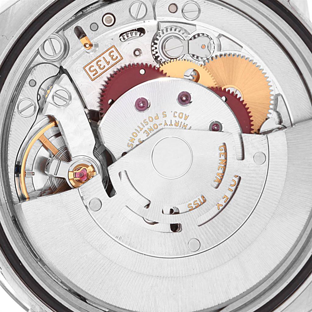 This image shows a close-up of the internal movement mechanism of a Rolex Datejust 116200 Men's Stainless Steel Silver Dial 116200 Men's Stainless Steel Silver Dial watch.