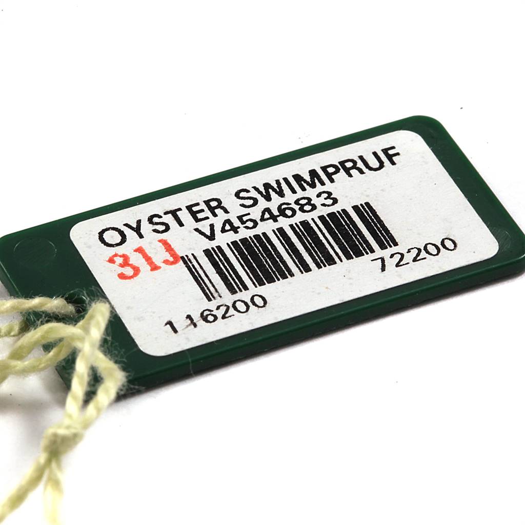 The image shows a green Oyster Swimpruf tag with barcode and model details for a Rolex Datejust 116200 Men's Stainless Steel Silver Dial 116200 Men's Stainless Steel Silver Dial watch.