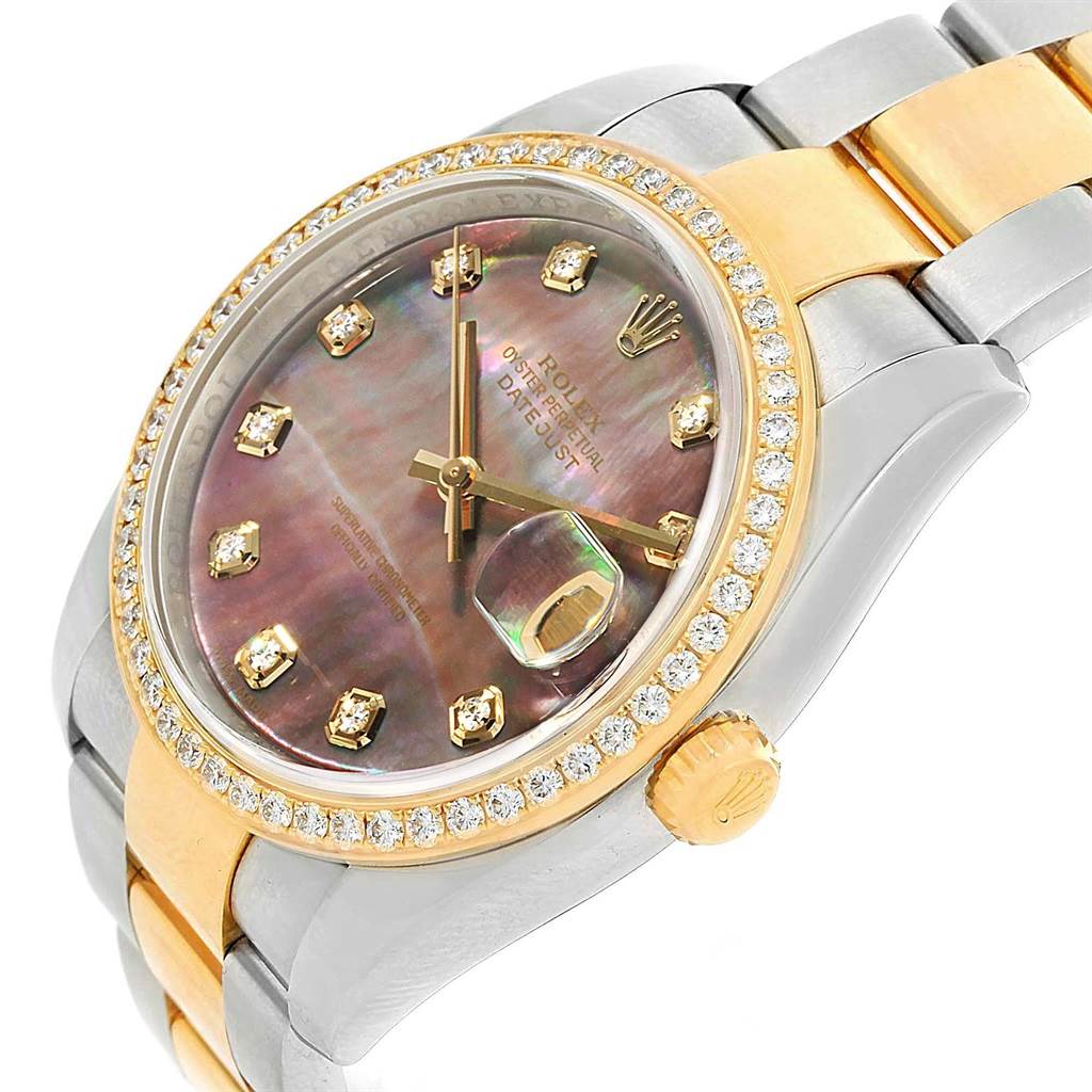 The Rolex Datejust 116243 Men's Stainless Steel Mother of Pearl Dial 116243 Men's Stainless Steel Mother of Pearl Dial watch is shown at an angled view, displaying its dial, crown, and part of the bracelet.