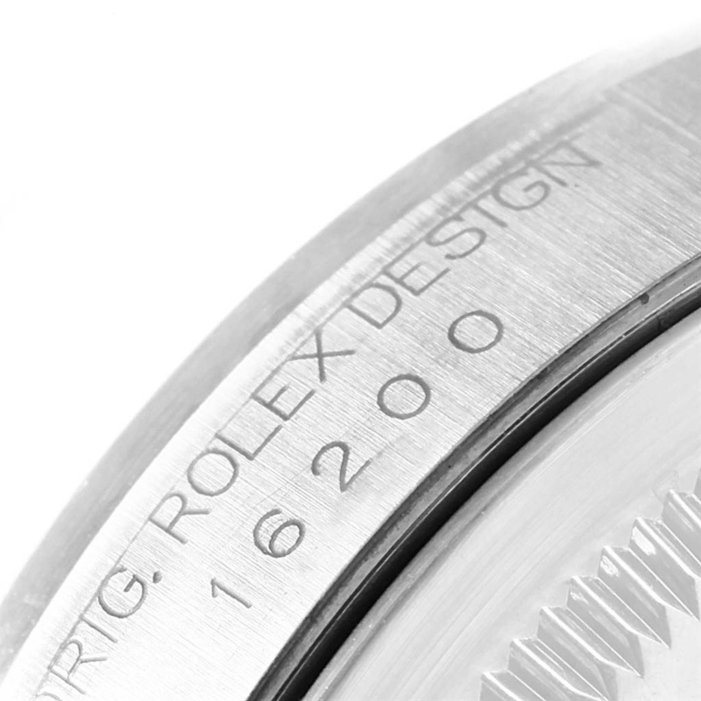 This image shows a close-up of the case back engraving on a Rolex Datejust 16200 Men
s Stainless Steel White Dial 16200 Men
s Stainless Steel White Dial model watch, highlighting its reference number.