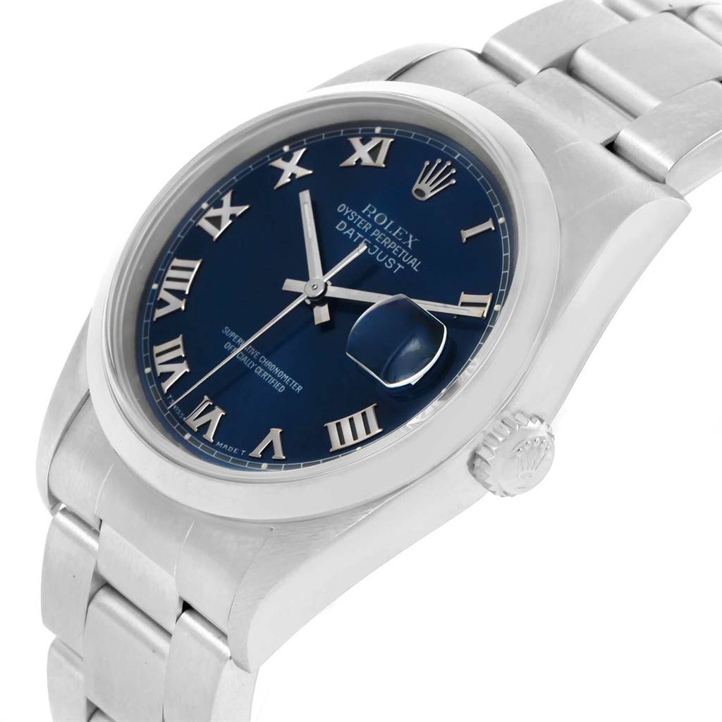 This image shows a Rolex Datejust 16200 Men's Stainless Steel Blue Dial 16200 Men's Stainless Steel Blue Dial watch at a tilted angle, highlighting its blue dial, Roman numerals, and metal bracelet.