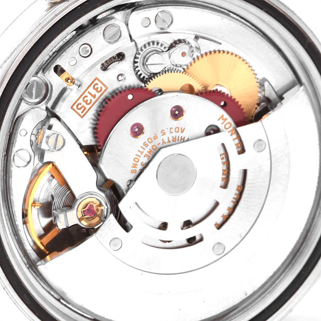 This image shows the intricate internal mechanism and movement of a Rolex Datejust 16200 Men's Stainless Steel Blue Dial 16200 Men's Stainless Steel Blue Dial watch.