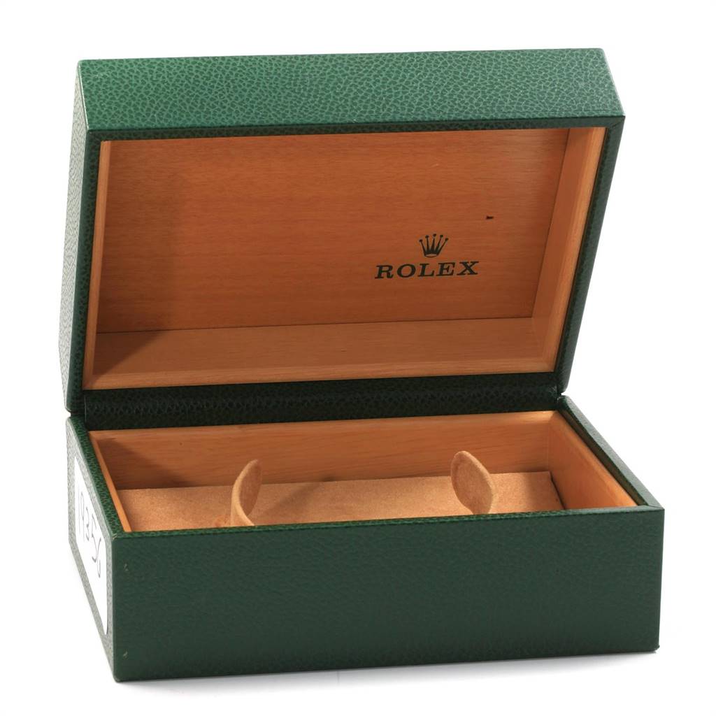This image shows an open, green leather Rolex watch box, designed to hold the Datejust model.