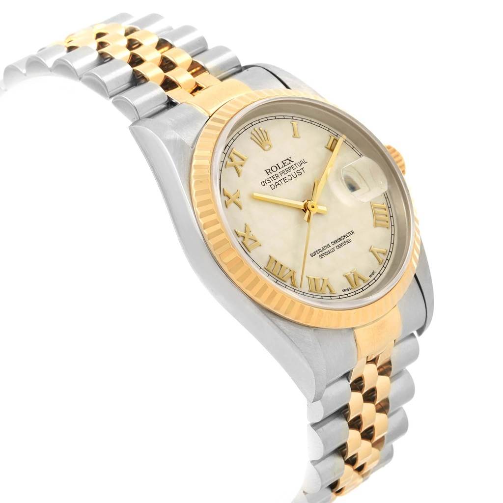 This image shows a Rolex Datejust 16233 Men
s Stainless Steel Beige Dial 16233 Men
s Stainless Steel Beige Dial watch at an angle highlighting the dial, bezel, and two-tone bracelet.