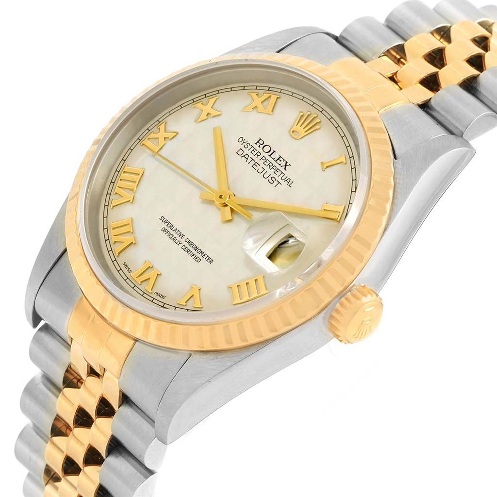 The image shows the angled view of a Rolex Datejust 16233 Men
s Stainless Steel Beige Dial 16233 Men
s Stainless Steel Beige Dial watch with its bezel, dial, crown, and part of the bracelet.